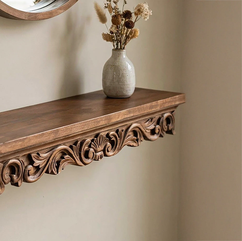 Hand-carved solid wood wall shelf featuring intricate scrollwork details