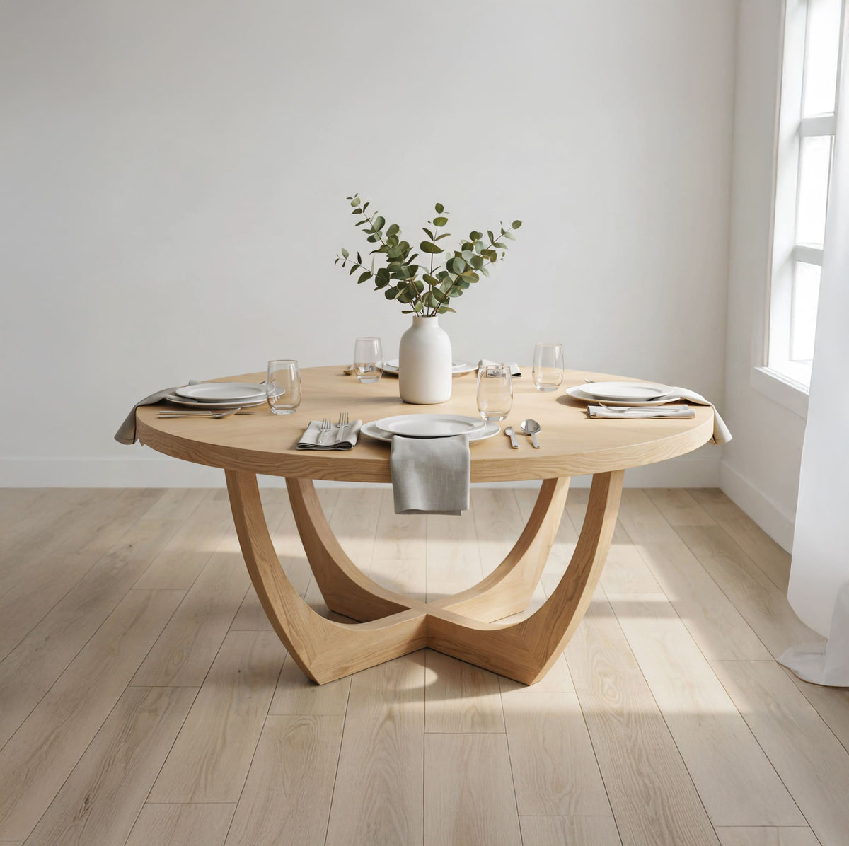 Solid wood round dining table displayed in a contemporary dining room setting