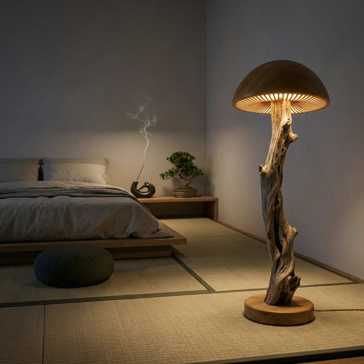 Mushroom floor lamp with driftwood stem and carved wood base in a minimalist bedroom